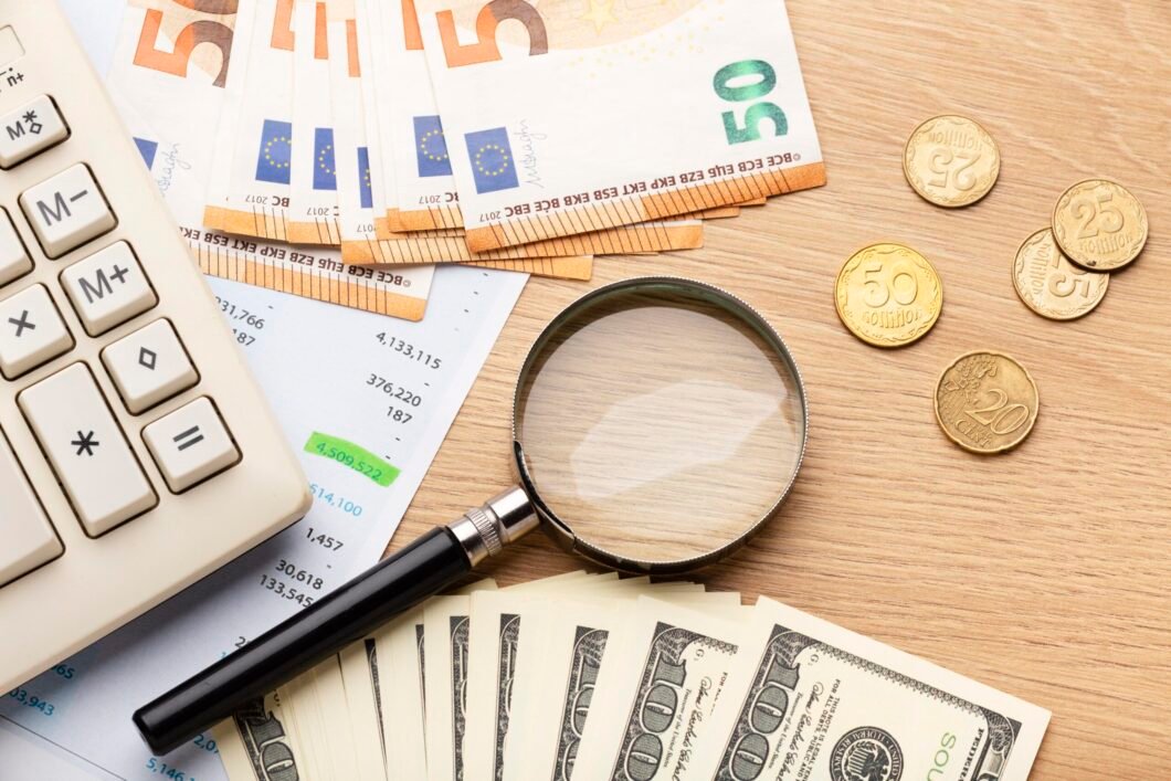 top-view-calculator-money-arrangement